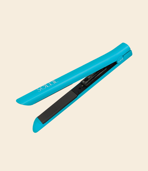 turquoise soleil flat iron with black ceramic plate and details, with on and off button