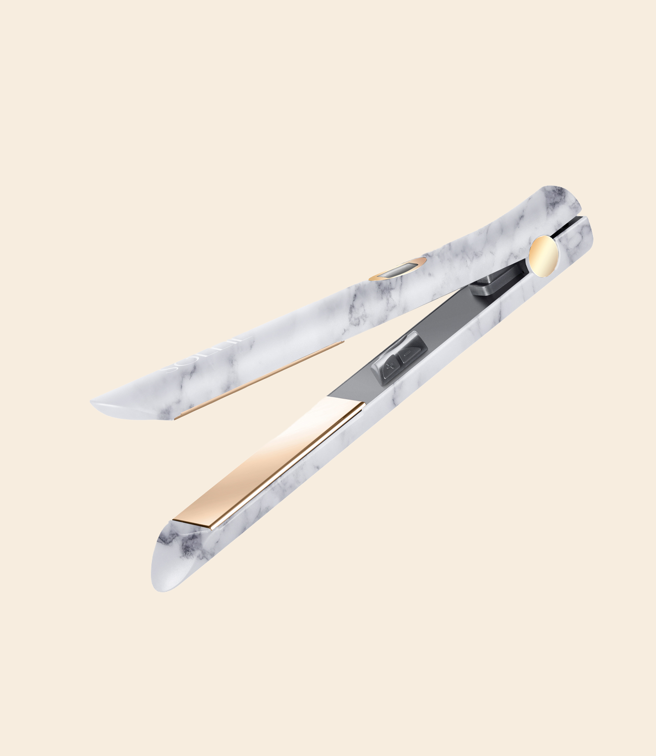 soleil marble Infrared flat iron with gold plates and gold and black detail against a light beige background